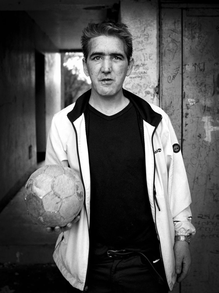 Edinburgh, Craigmillar. Kick it like Mc. Photographic documentary about the social influence of football in Scotland. Copyright: Toby Binder