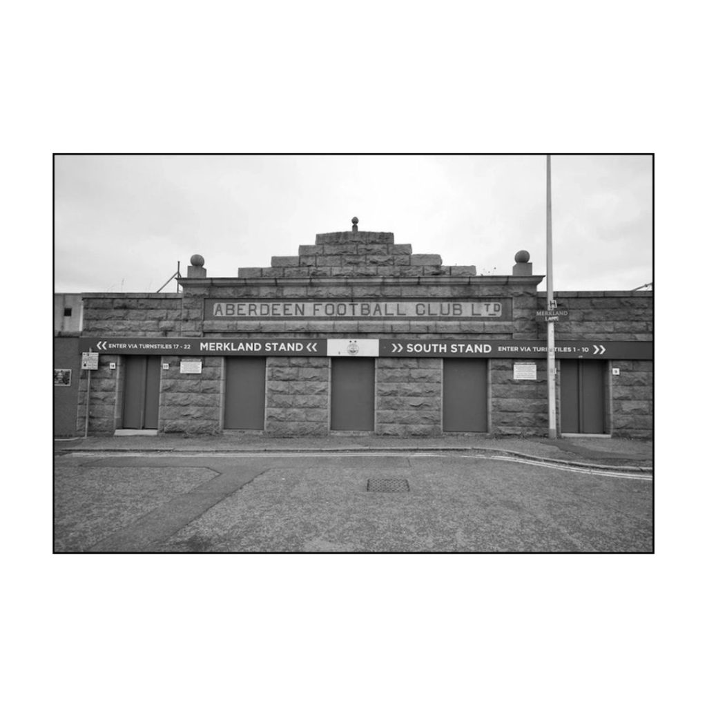 The main entrance to Pittodrie Stadium, Aberdeen F.C. Archival Giclée print with a pearl finish, unframed.