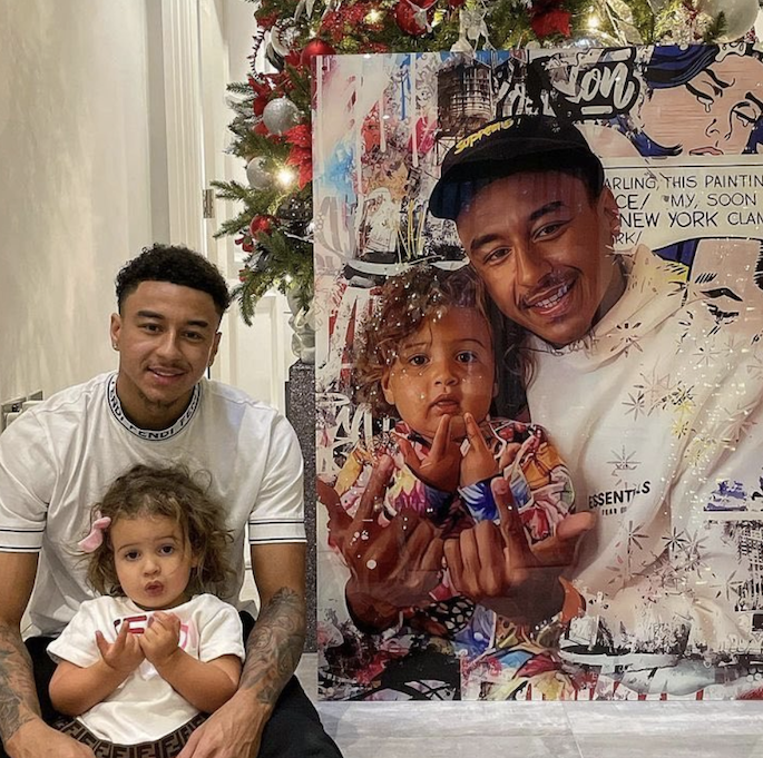 Jesse Lingard at home with his Boogie Moli artwork