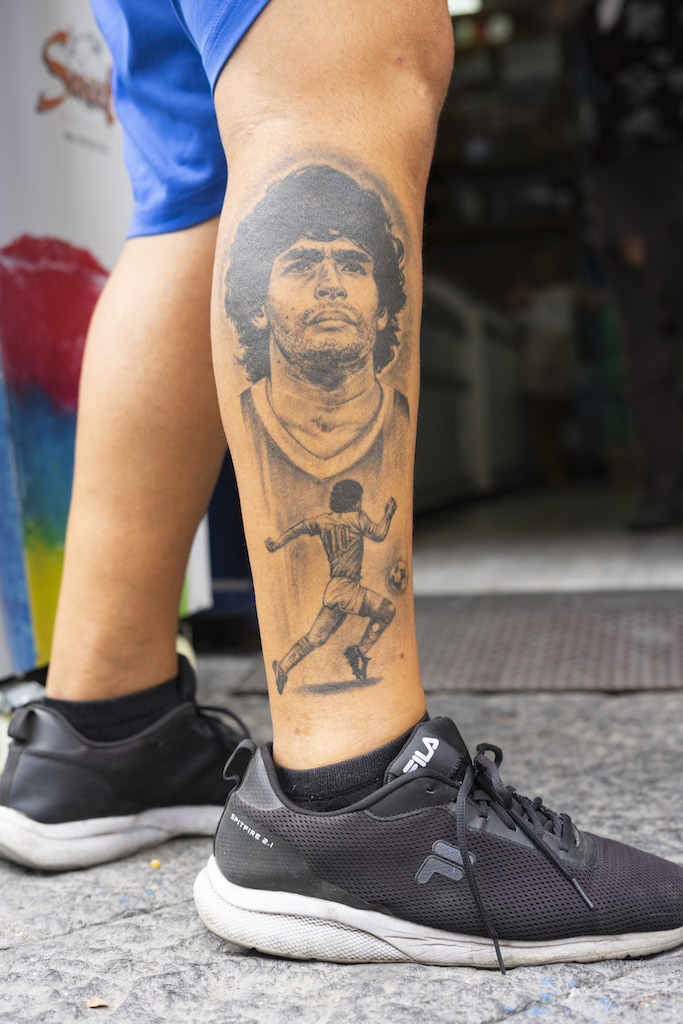 Diego Maradona of Argentina and Napoli, shrine, graffiti, artwork, tattoo, Naples, Italy.