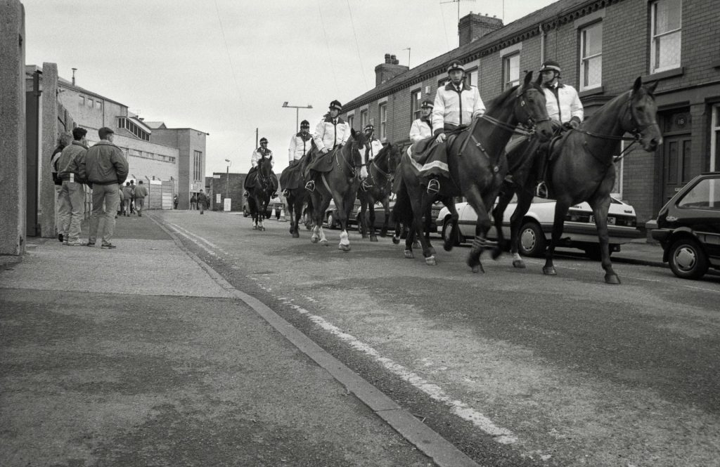 Police horses patrol outside Anfield 1991