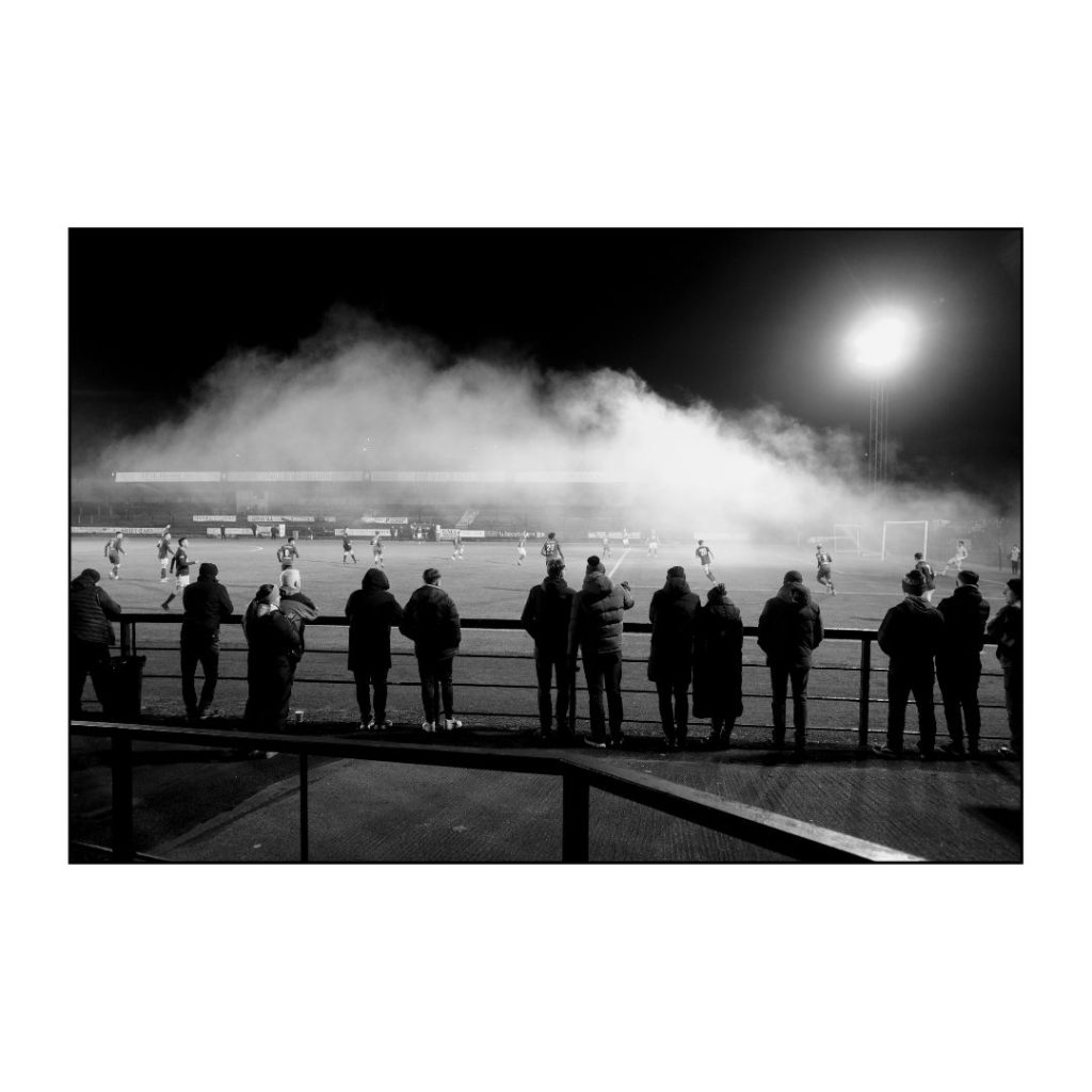 Albion Rovers 3-0 Linlithgow Rose, 13.2.24. Cliftonhill Stadium, Coatbridge. Lowland League. Fans let off some pyrotechnics as game kicks off. Iain McLean Pyro