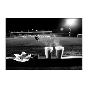 Half time pie and Bovril on a cold Scottish January night. Albion Rovers v Queens Park, Cliftonhill Stadium. Archival Giclée print with a pearl finish, unframed. Iain McLean