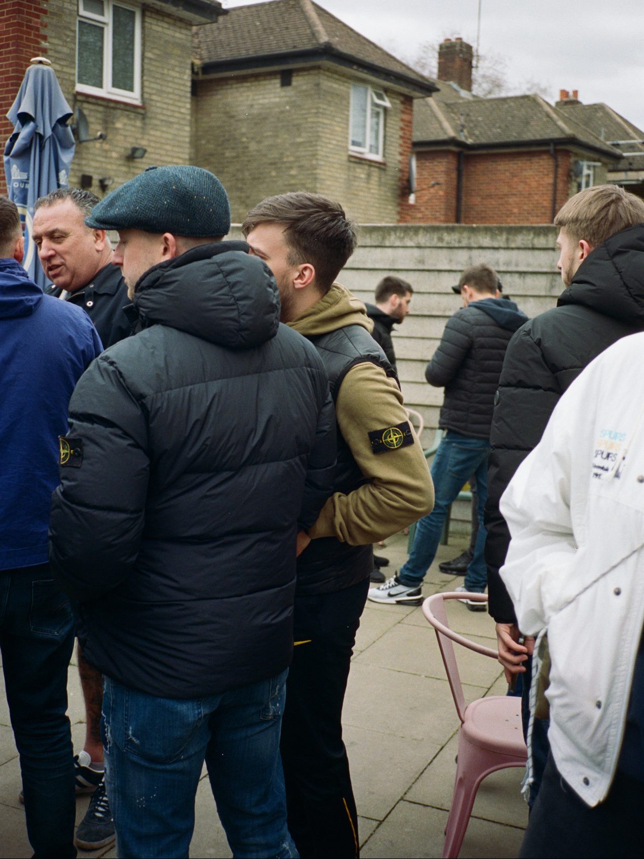 Tottenham Hotspur supporters photo series. TRAINING GROUND [Blokes at worship - blokes at war] Kirsten Allen