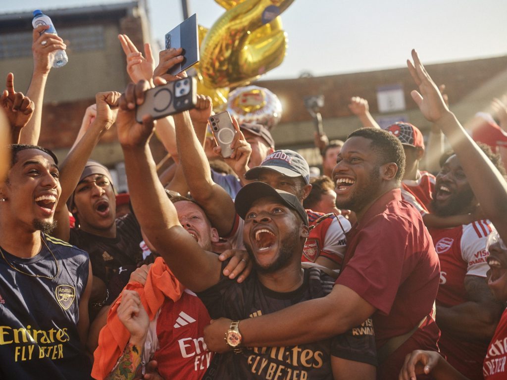 Arsenal fans celebrate becoming Champions away at Selhurst Park © Orlando Gili